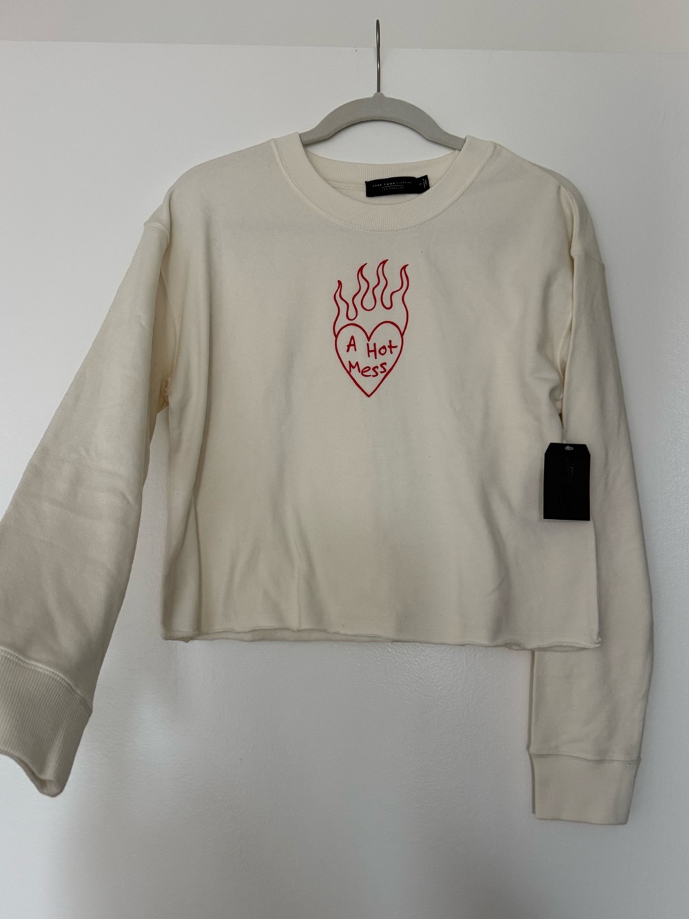Junk Food Clothing Cream Cropped Crewneck with Red Heart Flame Graphic